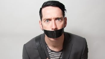 The Boy With Tape On His Face