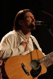Darren Coggan as Cat Stevens in Peace Train.