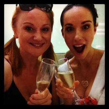 A celebratory 'clink' in honour of a wonderful series. Marika Aubrey and Erin James feature in the final How We Do What We Do.