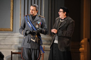 Benjamin Rasheed as Spoletta and Amanda Echalaz as Tosca. Photo credit Branco Gaica.