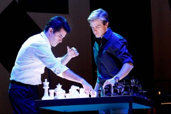 The Production Company's Chess. Martin Crewes and Simon Gleeson. Image by Jeff Busby The Production Company's Chess. Martin Crewes and Simon Gleeson. Image by Jeff Busby