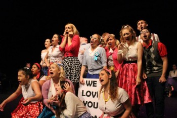 Adele Parkinson (Kim), Jessica James-Moody (Ursula) and Company. Photo by Amelia Burns