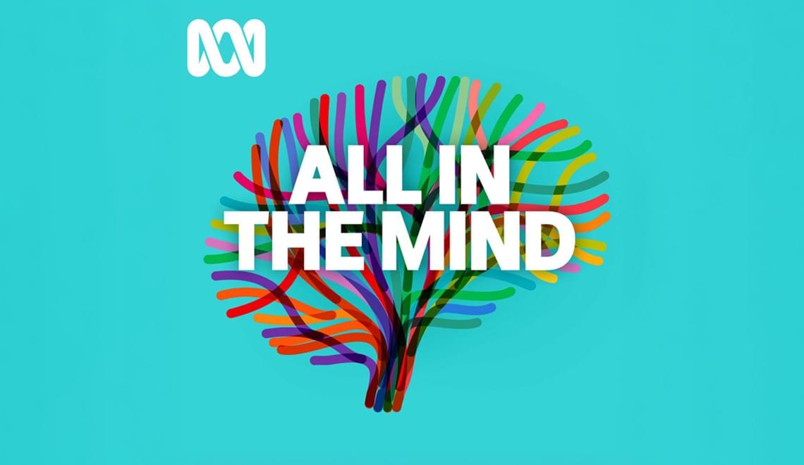 A brain graphic made of colourful lines in front of a bright turquoise background. The text in front reads - ALL IN THE MIND